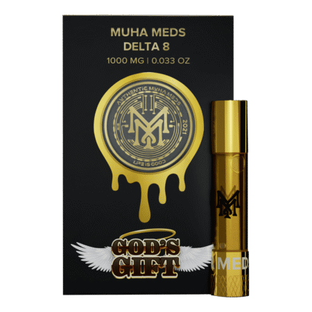 A close-up of the Muha Meds God's Gift 2G disposable vape, highlighting its sleek design and branding.