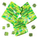 A package of Lime Mambas Indica gummies with several green, sugar-dusted gummies displayed next to it.